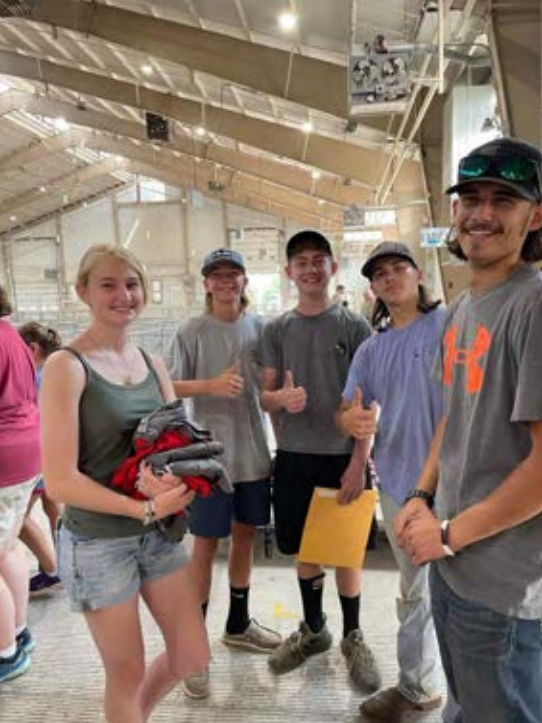 4H group of young men and women at the fair